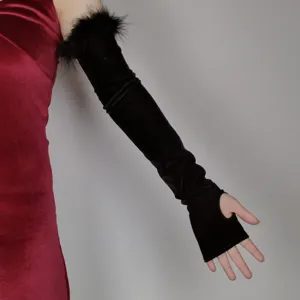 Detailed view of retro velvet feather fingerless long gloves for evening party and dance.