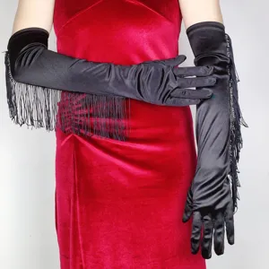 Close-up detail of black satin long gloves with elegant fringe design for evening party wear.