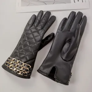 Women winter warm black PU leather gloves with quilted design and elegant golden chain cuff details.