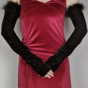 Retro black velvet long gloves with feather cuffs, elegant evening party dress accessory detail.