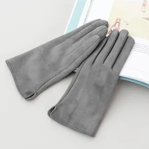 Grey suede winter gloves detail shot, soft plush warm touch screen gloves for women.