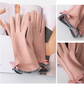 Pink women winter warm gloves with plush fur cuff and cute bow detail detail view display