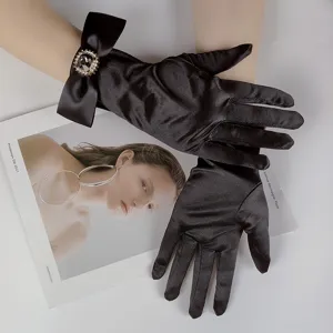 French retro black satin gloves with rhinestone bow for bridal wedding photography.