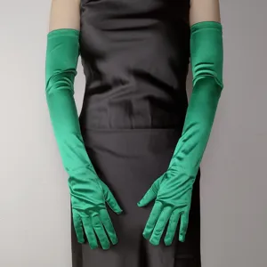 Detail view of long green satin gloves, featuring smooth stretch fabric and elegant fit.