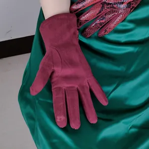 Close-up detail view of women's warm faux suede gloves with stylish snakeskin pattern accents.