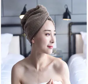 Thickened coral fleece dry hair cap in solid brown, super absorbent pineapple grid texture.
