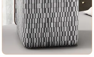 Large capacity striped quilt storage bag, durable fabric home clothes organizer box.
