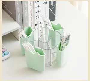Close-up of rotating desktop storage organizer with multi-grids for pens and makeup brushes.