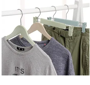 Detailed view of multi-functional plastic pants hangers and clip storage racks for apparel.