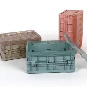 Foldable plastic storage box desktop organizer set of three colorful storage containers.