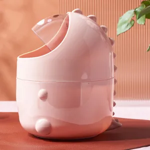 Mini cute dinosaur desktop trash can plastic swinging lid wastebasket for office dorm room.