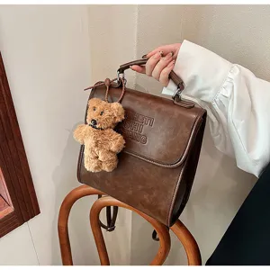 Vintage brown leather backpack for women stylish school bag with cute bear pendant