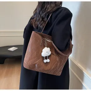Korean style vintage tote bag for women, large capacity shoulder underarm bag with cute cloud charm.