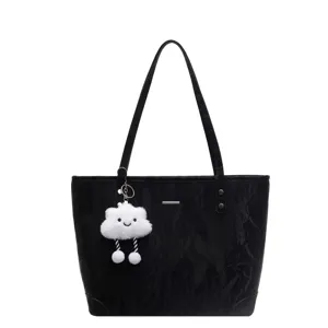 Black tote bag for women with cloud charm, stylish casual PU leather shoulder bag.