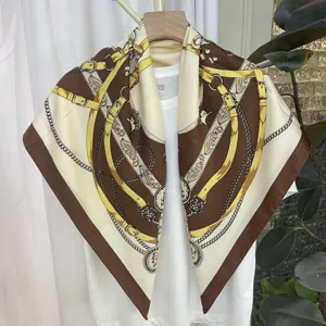 Elegant 90x90cm silk scarf featuring classic brown equestrian belt print, luxury style.