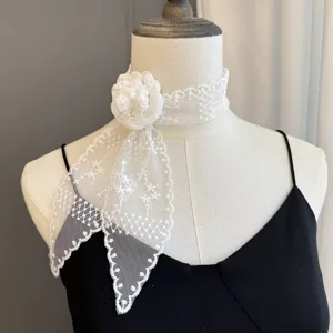 Detailed view of white lace floral choker scarf, elegant ribbon design for versatile styling.