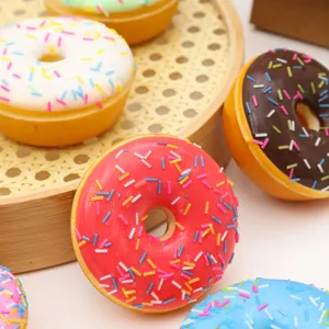 Close-up of colorful PU simulated donuts with sprinkles for creative home decoration