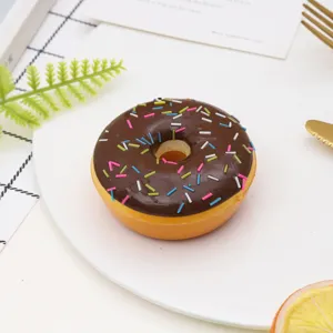 Close-up of a realistic PU chocolate donut model with colorful sprinkles on a white plate