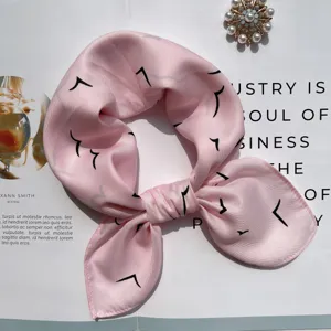 Pink silk scarf with minimalist black print, elegant hair accessory or neck wrap for women.