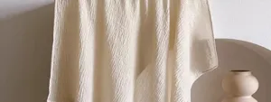 Lightweight cotton linen crinkled solid color scarf shawl, soft texture detail view.