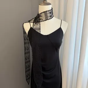 Elegant black lace ribbon scarf for women, versatile long streamer hair band and chic neck wrap.