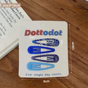 Vista dettagliata di graziose mollette BB per capelli floreali e tinte unite stile coreano.