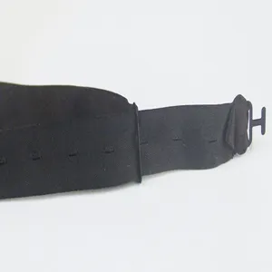 Black bow tie adjustable strap and metal hook detail close-up view fashion accessory