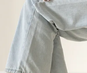 Comfortable light blue denim jeans with classic twill fabric and stylish relaxed fit design.