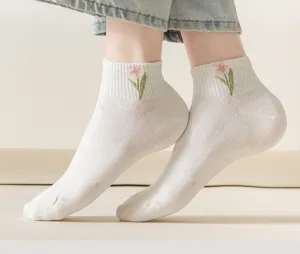 Sweet white short socks for women with cute tulip embroidery and pink polka dots, soft cotton.