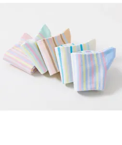Detailed view of pastel striped crew socks, soft cotton texture, cozy everyday casual wear.