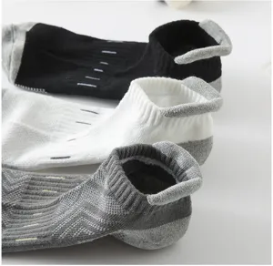 Men athletic ankle socks with breathable mesh, heel tab, and cushioned arch support for running.