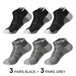 Detail view of men's athletic running socks in black and grey with breathable mesh design.
