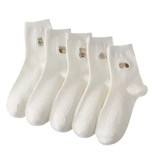 Cute white ribbed mid-calf socks for women featuring sweet cartoon embroidery designs daily wear.