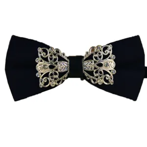 Men's black bow tie with elegant silver filigree metal and crystal rhinestone centerpiece.
