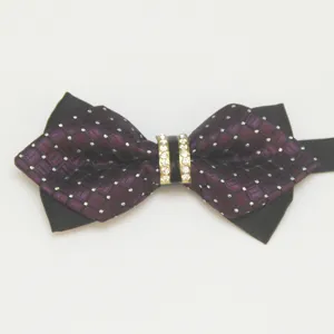Detail view of men's sharp corner rhinestone bow tie, purple plaid and black formal neckwear.