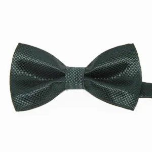 Dettaglio papillon bambino verde scuro con trama jacquard a griglia fine e texture
