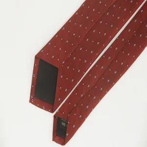 Classic red patterned men's narrow necktie, elegant business formal wear accessory.