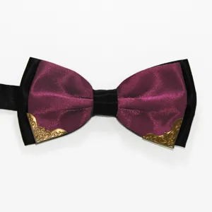 Close up detail of mens purple black bow tie with metallic corners for formal wedding wear