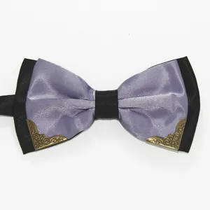 Close-up detail of the elegant purple and black bow tie featuring vintage metal corner accents.