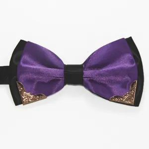 Detail view of men's double layer purple and black bow tie with gold metal corner decor.