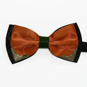 Close-up detail of double-layer men bow tie featuring dual-color design and vintage metal corners.