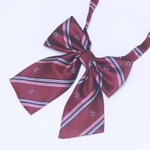 Burgundy Japanese JK uniform bow tie with striped pattern and small floral details for women.