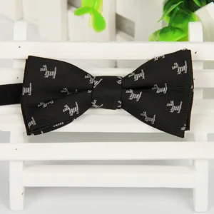 Nœud papillon noir en jacquard pour enfants avec motif de chien mignon, idéal pour fêtes.