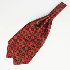 Gedetailleerd overzicht van rood met zwarte herenstropdas met klassiek vintage geometrisch patroon.