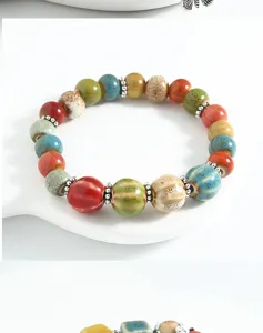 Colorful ceramic beaded bracelet detail view, showcasing smooth glazed multi-color beads.