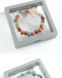 New Chinese style ceramic beaded bracelet with cross and butterfly charms for women.