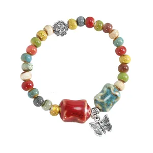 Colorful ceramic bead bracelet with butterfly charm boho style handmade jewelry main view