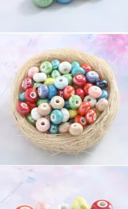 Close-up detail of colorful ceramic abacus beads arranged nicely in a woven straw nest.
