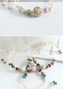 Handgemachte Keramikperlen Armband Detailansicht mit retro geflochtener Kordel und Perlen.