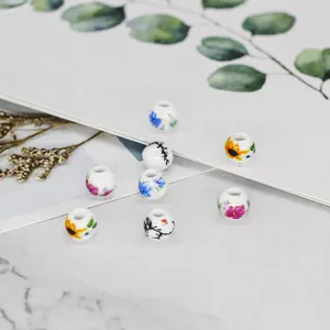 Ceramic floral loose beads for DIY jewelry making, handmade bracelets and crafting accessories.